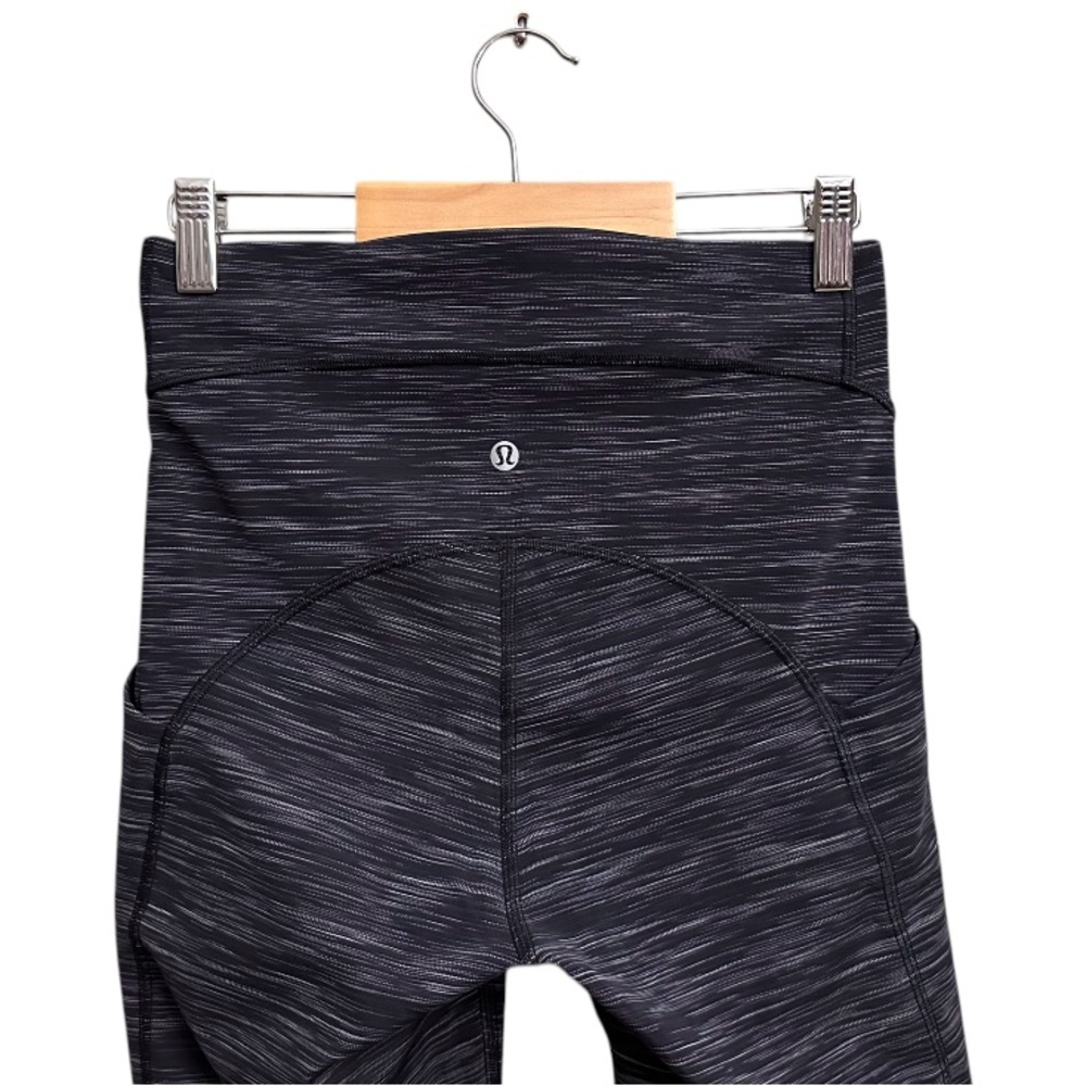 Lululemon Power Thru High-Rise Tights 25" in Heathered Black - Picture 6 of 9